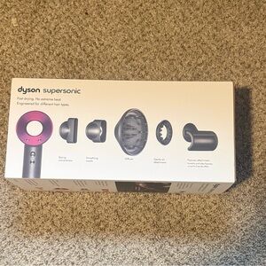 Dyson Hair Dryer with Pink and Black Attachments